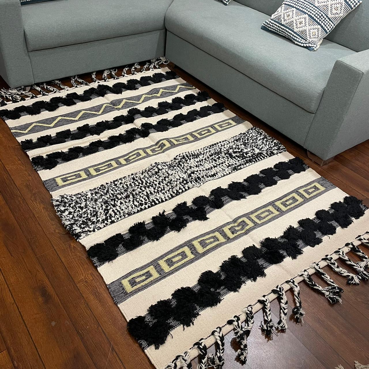 Hand-weaved Black Ruffle Cotton Rug with zari work